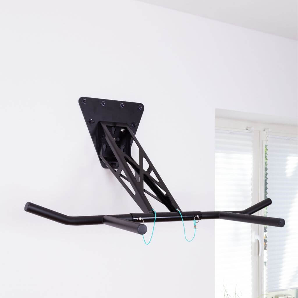 Pull-up and dip bar for wall mounting on interior and exterior wall