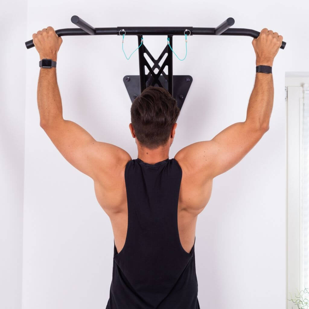 Pull-up and dip bar for wall mounting on interior and exterior wall