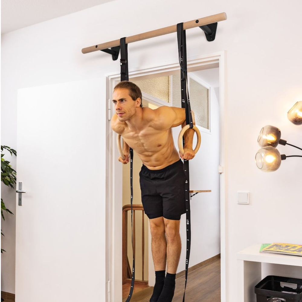 Wooden pull-up bar for wall mounting above door frame
