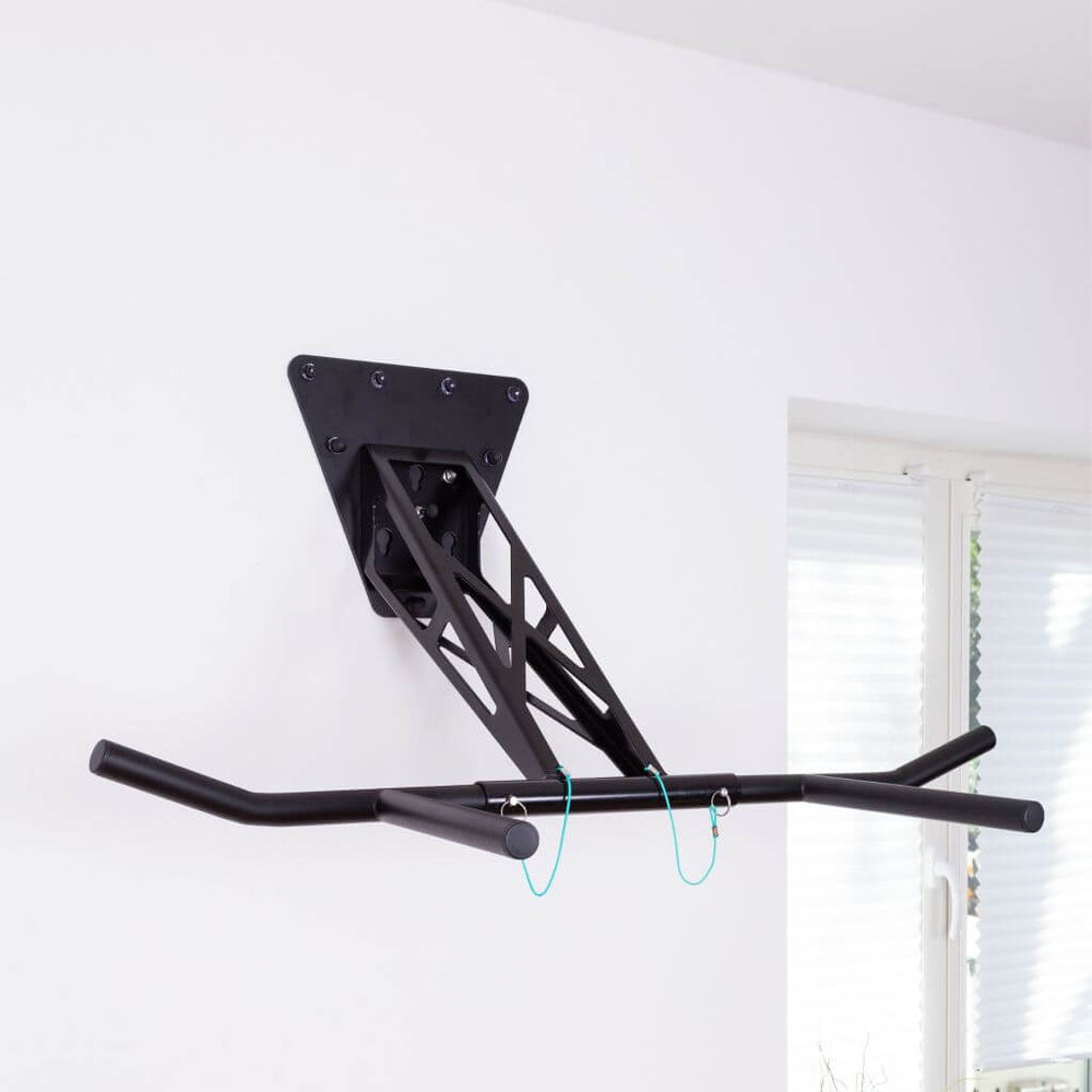 Pull-up and dip bar for wall mounting on interior and exterior wall